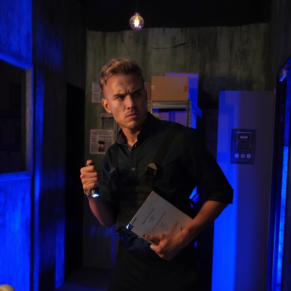 A caucasian spy holding a torchlight and secret document trying to sneak out from the secret operative location (enemy's base)